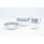 A collection of Wedgwood Florentine tea and dinner ware to include a tea pot (no lid), a creamer,