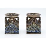 A near pair of Doulton Lambeth table salts with a bird design, circa 1876 with marks to base. In