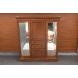 Edwardian inlaid gentleman's inlaid wardrobe with 2 mirrored doors and draws section in the