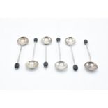 A set of 6 silver tea spoons with a leather effect bobble. 41.3 grams gross weight. Birmingham 1923.