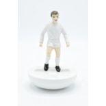 Royal Doulton Subbuteo figure in a white kit with black boots. This is a trial piece and only has
