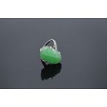 Ladies platinum set jade & diamond ring: Jade or similar hardstone cabochon gemstone with diamond