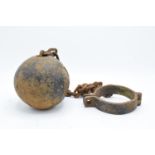 Antique 19th century cast iron prisoner's ball and chain. Working clasp. Signs of corrosion and rust