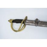 A reproduction sword in the style of a 19th century military sword. 109cm in length with metal sheaf