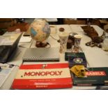 A mixed collection of items to include board games such as Monopoly and Scrabble (may be