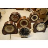 A collection of wooden cased mantle clocks, all spares and repairs. No postage.