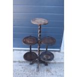 A 1930s wooden lazy waiter/ folding 3 tiered stand. 77cm tall. Age related wear and tear