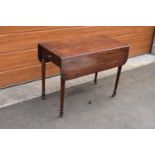 19th century mahogany Pembroke table on casters with a single draw. In good functional condition.