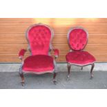 A pair of Edwardian upholstered His and Hers chairs on casters. Signs of old worm. There have been