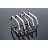 Silver toast rack. Birmingham 1931. 82.3 grams. In good condition.