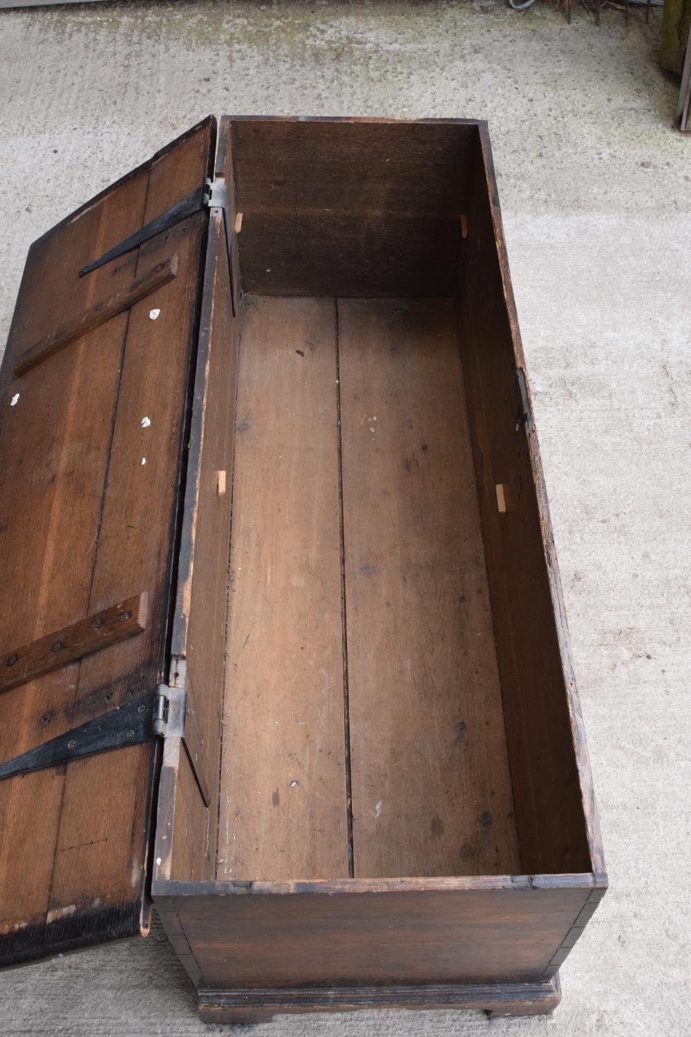 An early 19th century oak chest/ blanket box with a lift up lid. 121 x 44 x 47cm. In good - Image 6 of 13