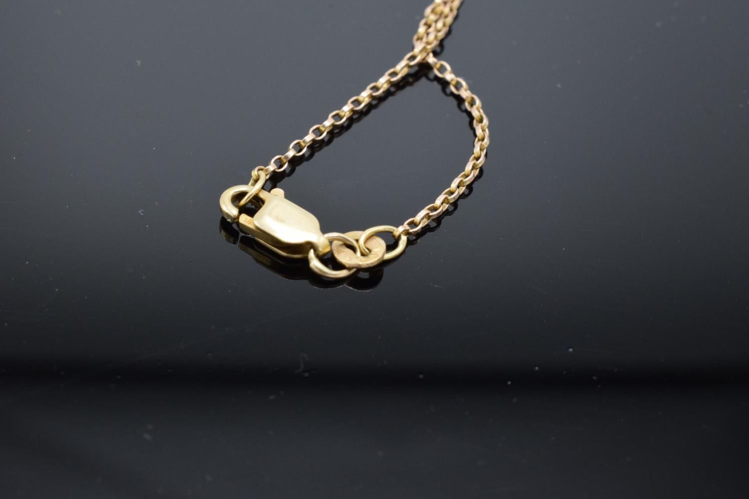 A 9ct gold chain together with a 9ct gold heart-shaped pendant with semi-precious stones, gross - Image 5 of 7