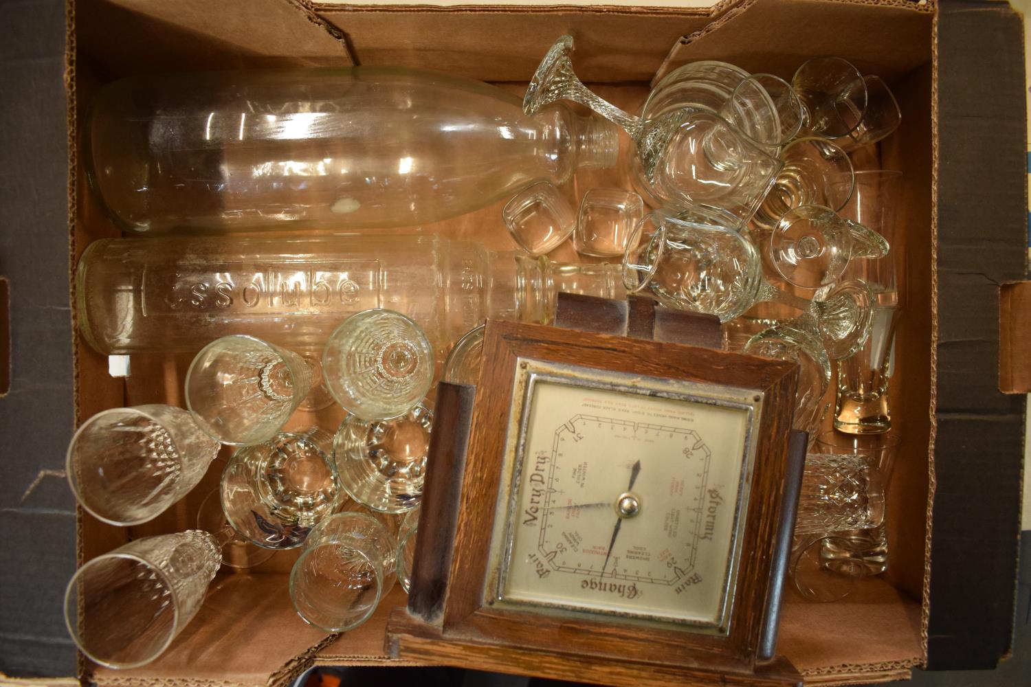 A mixed collection of items to include a wooden cased mantle barometer, 2 large glass bottles and