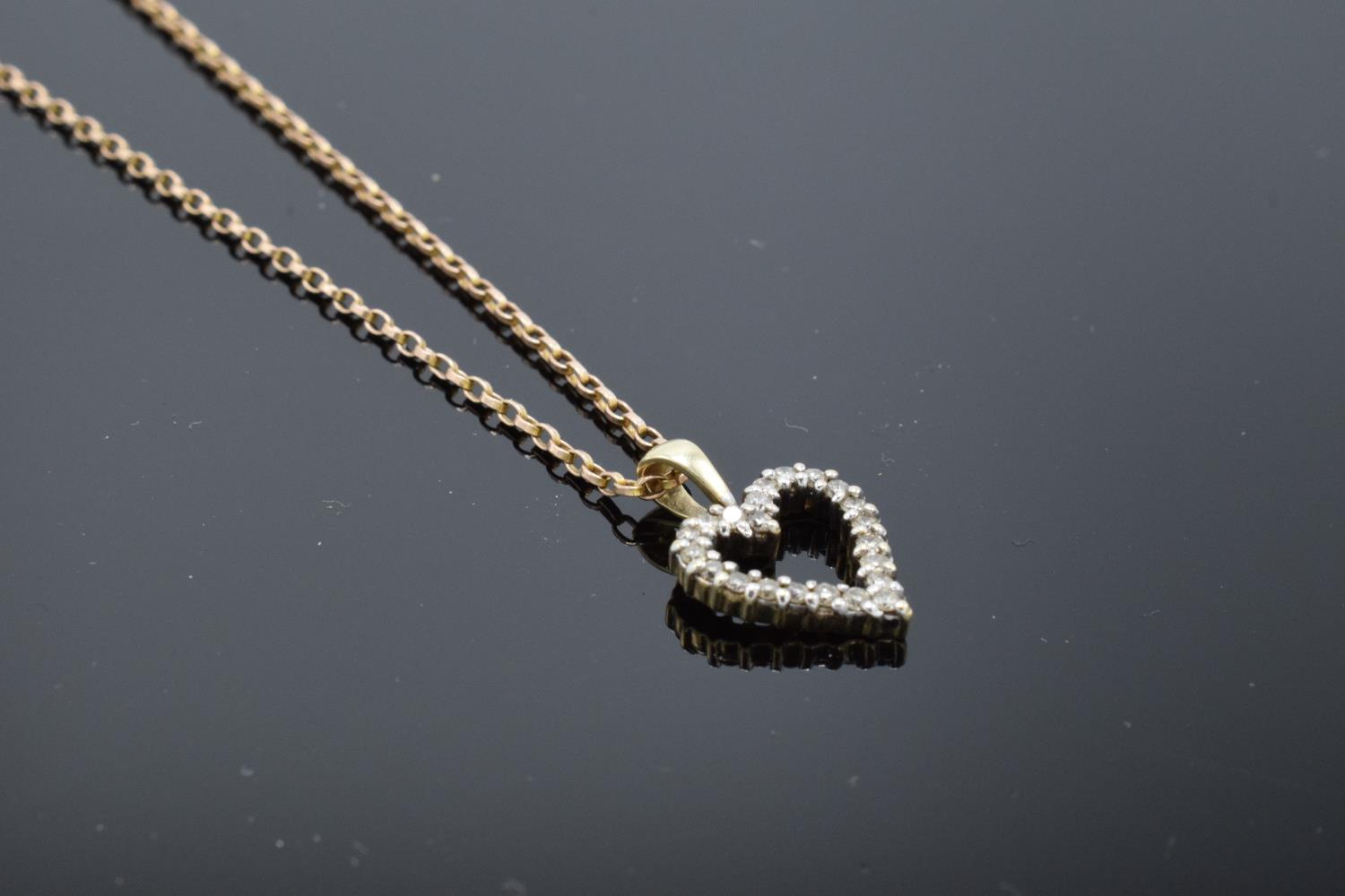 A 9ct gold chain together with a 9ct gold heart-shaped pendant with semi-precious stones, gross - Image 3 of 7