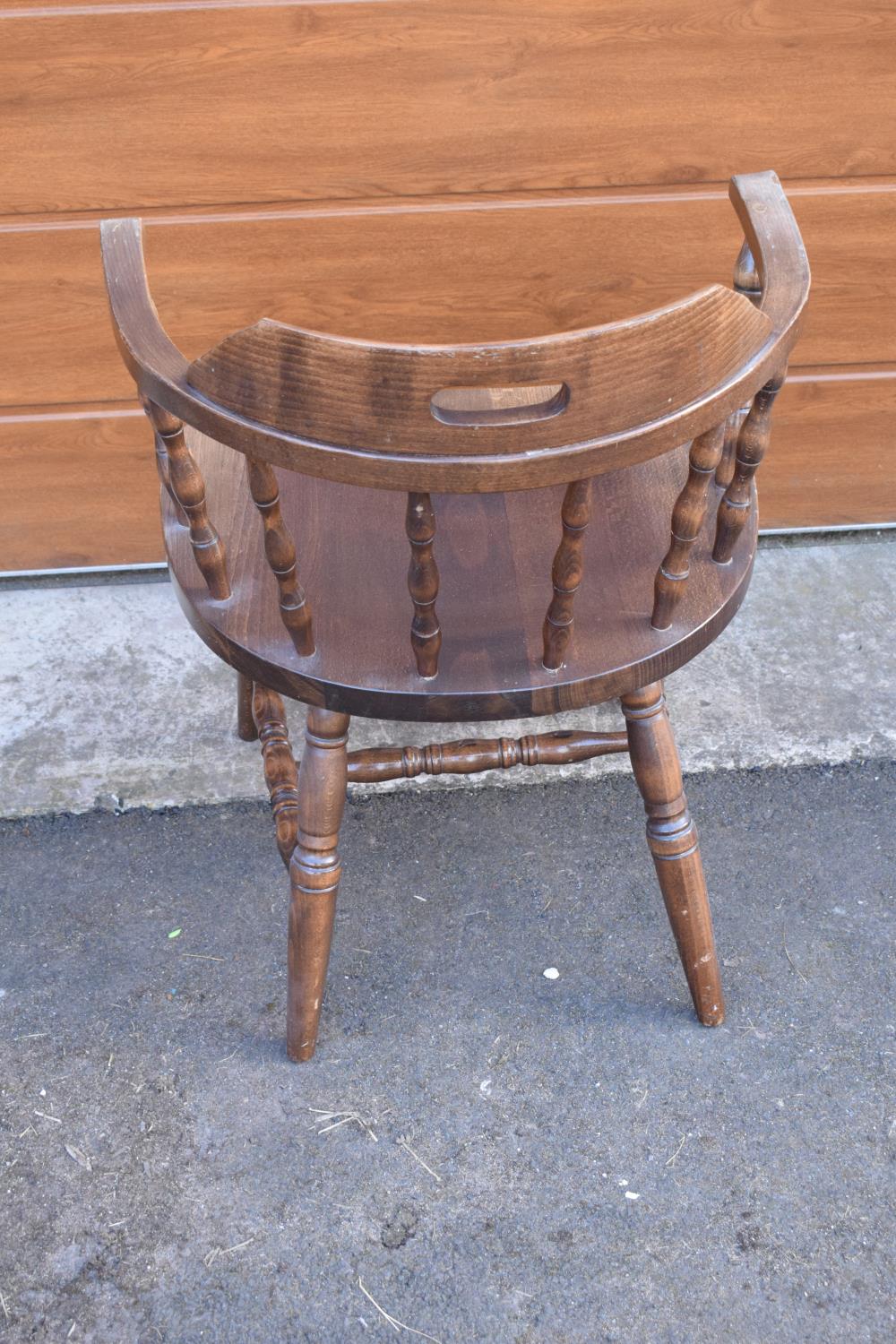 A reproduction wooden captains chair. 76cm tall. In good sturdy condition with some marks, water - Image 4 of 6