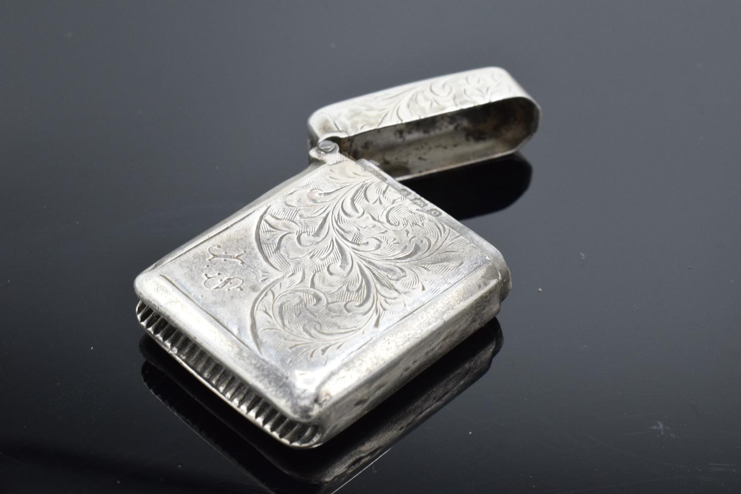 A collection of silver and silver coloured items to include a vesta case (Birmingham 1902) (holes to - Image 19 of 21