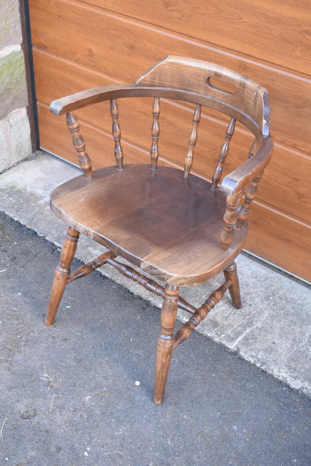 A reproduction wooden captains chair. 76cm tall. In good sturdy condition with some marks, water - Image 3 of 6