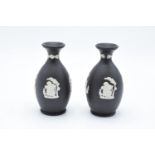 A pair of black Wedgwood Jasper ware vases. In good condition with no obvious damage or restoration.