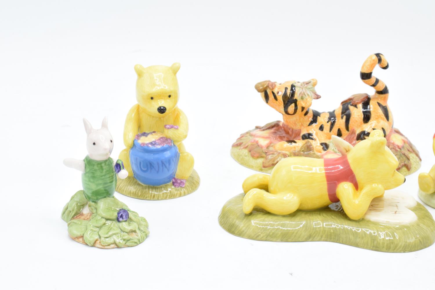 A collection of Royal Doulton Winnie The Pooh figures to include All the flowers are waking up, Love - Image 3 of 7