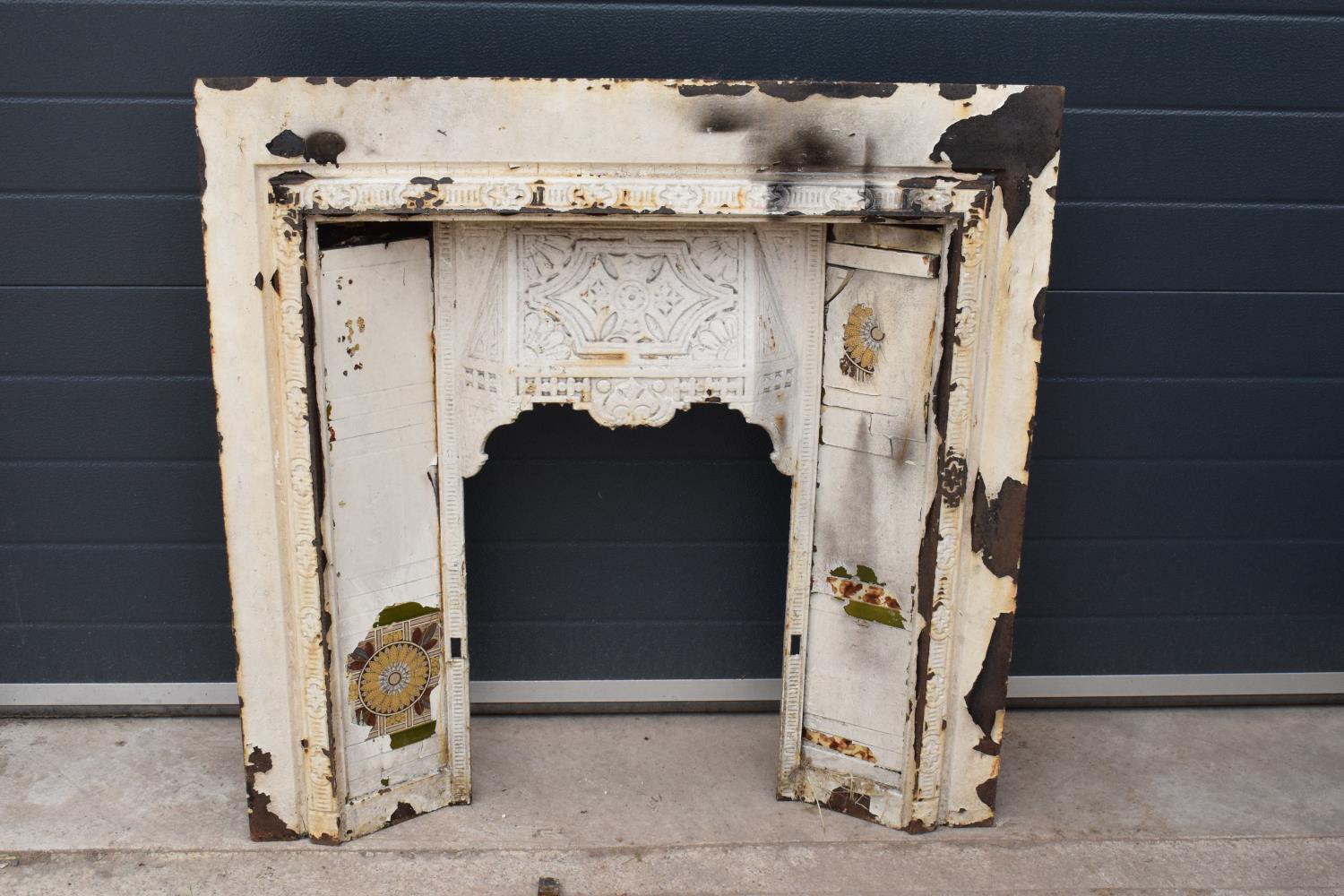 Victorian cast iron fireplace set with tiles. 96 x 14 x 97cm tall.