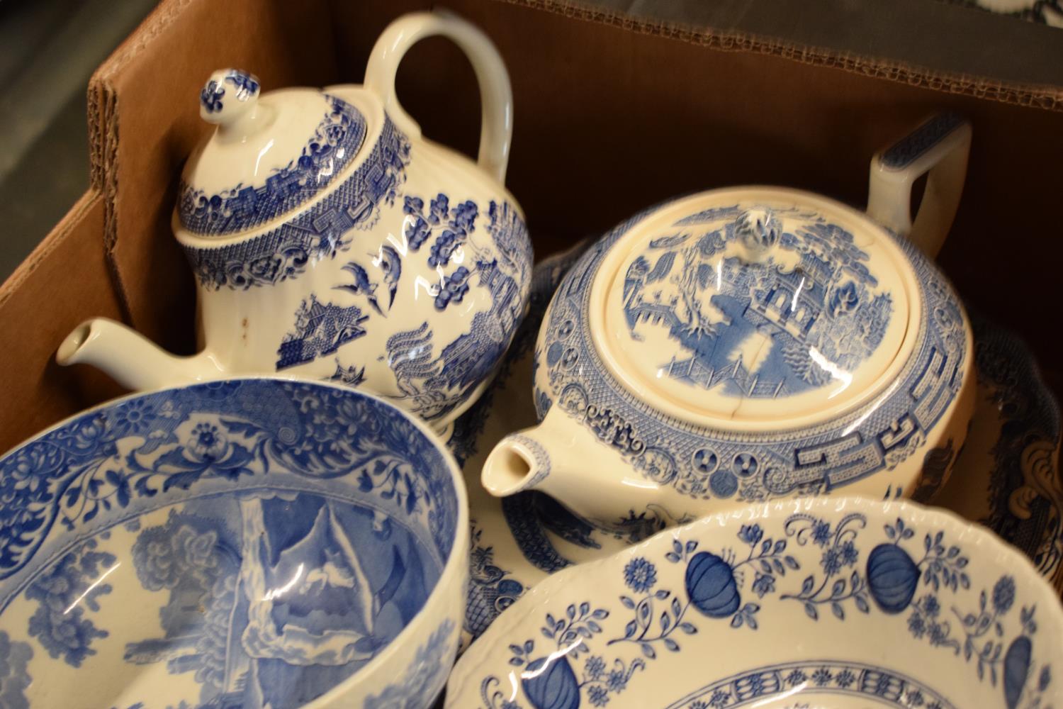 A large collection of 19th and 20th century blue and white pottery to include tea pots, duos, - Image 6 of 8