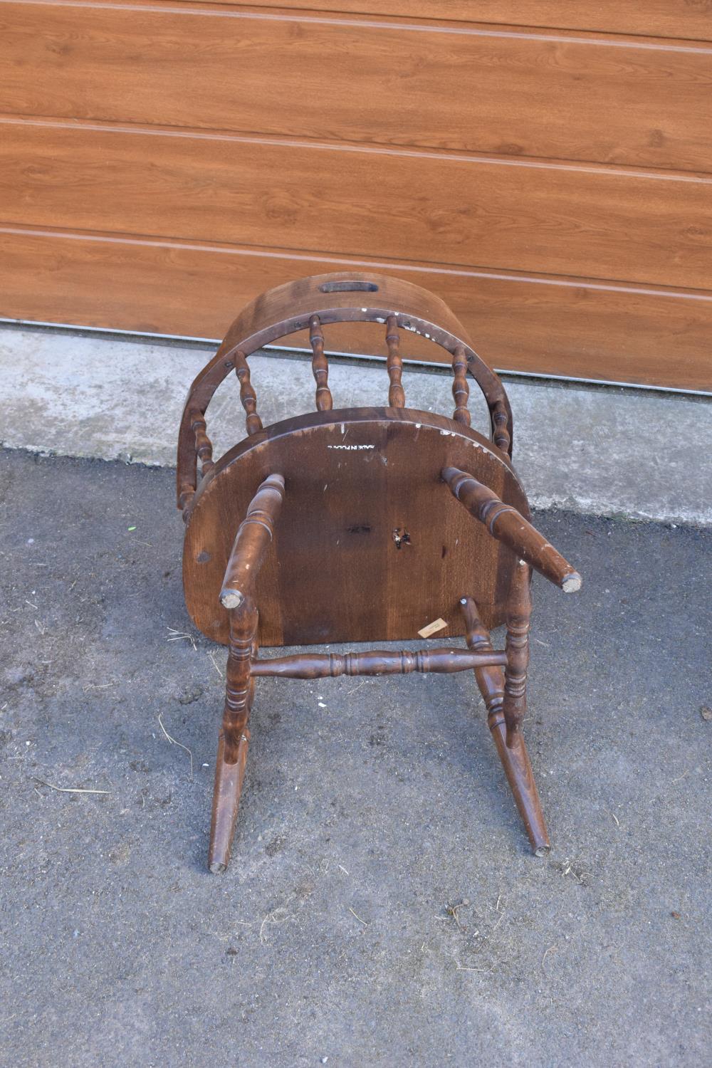 A reproduction wooden captains chair. 76cm tall. In good sturdy condition with some marks, water - Image 5 of 6