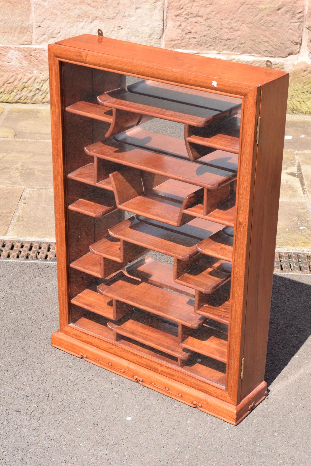 A 20th century fruit wood style ornate display cabinet. 53 x 13 x 75cm tall.