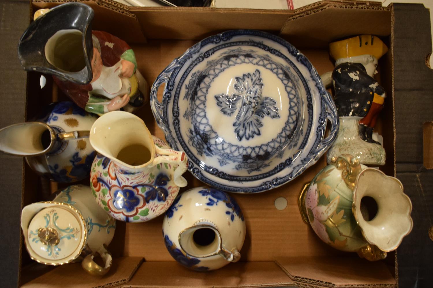 A collection of 19th century Staffordshire pottery to include Mayers jugs, Toby jugs, Moultan tureen