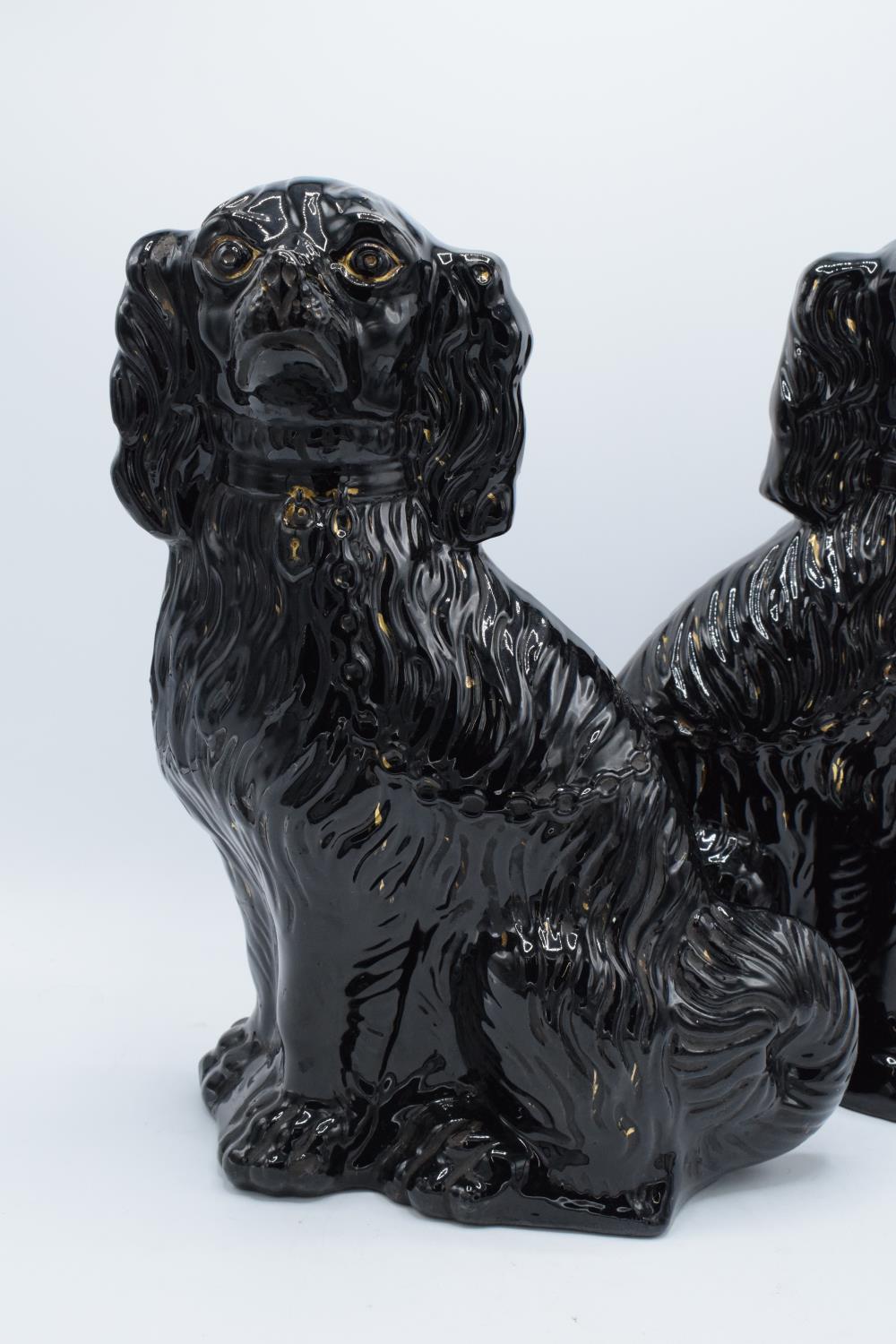 A pair of 20th century large Staffordshire dogs in a black gloss colourway with some gold highlights - Image 2 of 4