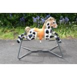 A vintage 20th century Mobo metal spring mounted rocking horse. In good condition with signs of