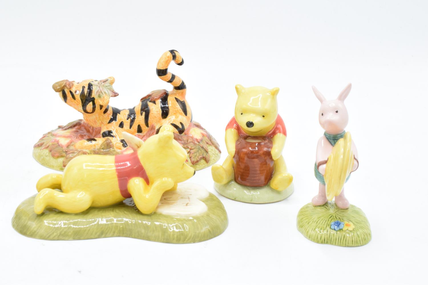 A collection of Royal Doulton Winnie The Pooh figures to include All the flowers are waking up, Love - Image 2 of 7