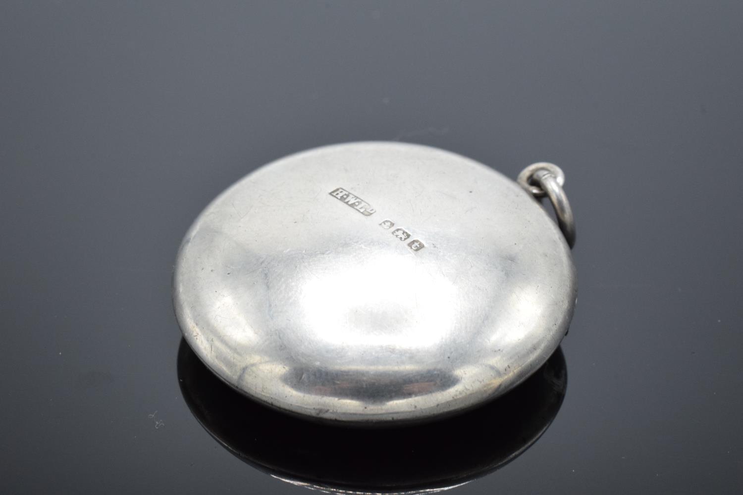 A silver circular compact with mirror contained in the lid Birmingham 1918. 11.9 grams gross weight. - Image 4 of 6