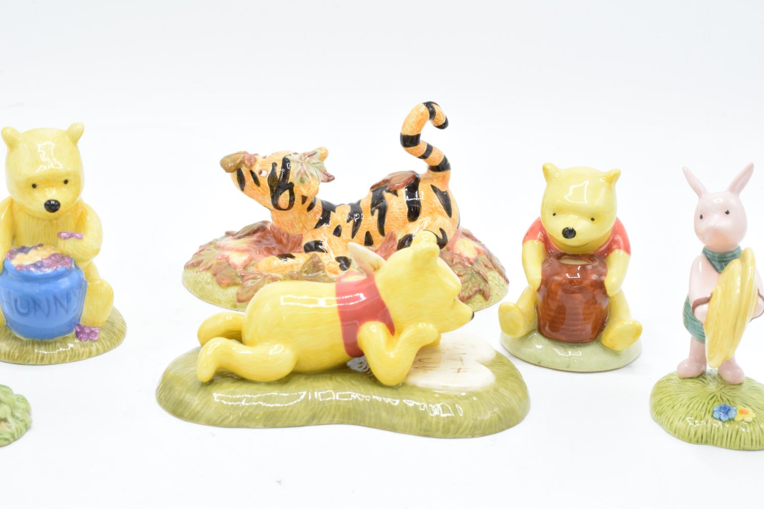 A collection of Royal Doulton Winnie The Pooh figures to include All the flowers are waking up, Love - Image 6 of 7