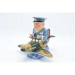 Bairstow Manor Collectables comical model of Winston Churchill in a spitfire. In good condition with