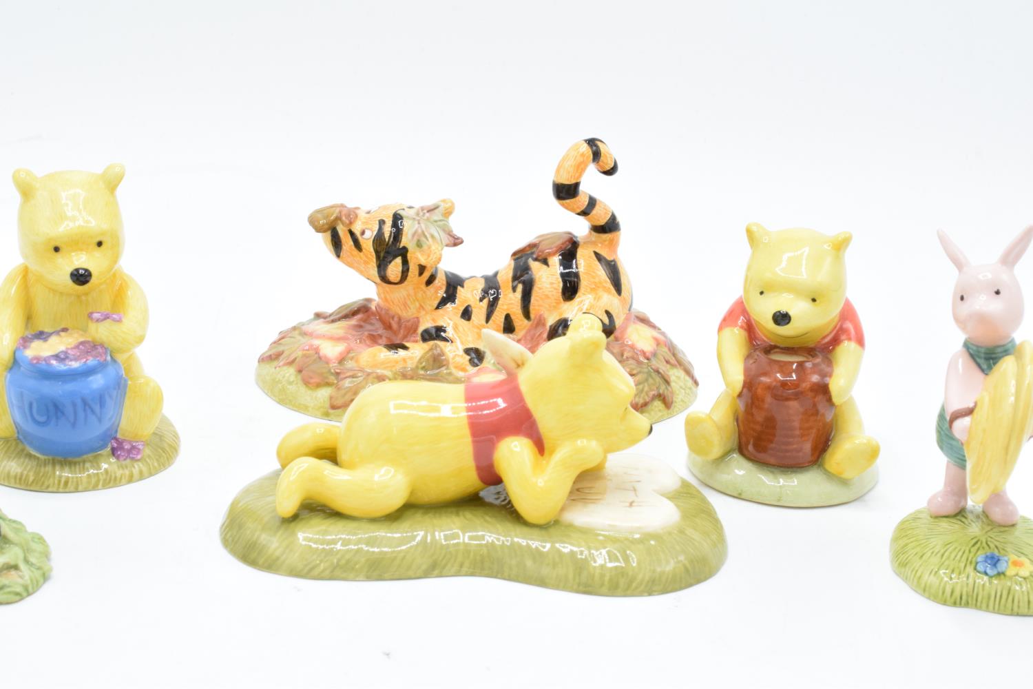 A collection of Royal Doulton Winnie The Pooh figures to include All the flowers are waking up, Love - Image 5 of 7