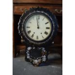 A Victorian papier-mache wall clock decorated with Mother of Pearl inlay with Roman numerals painted