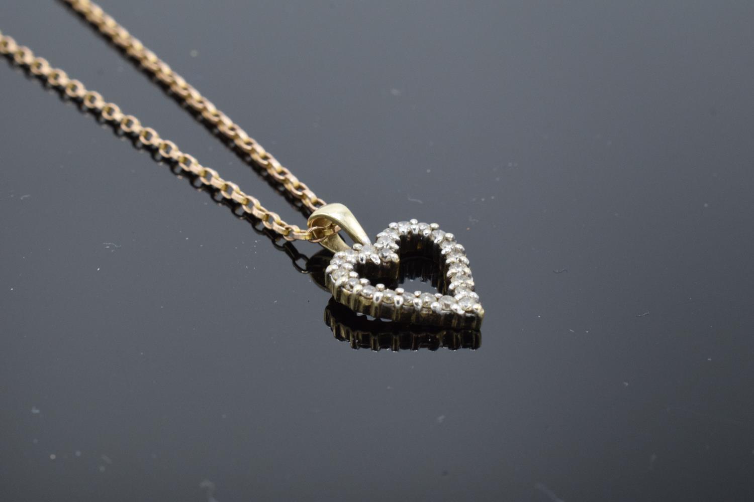 A 9ct gold chain together with a 9ct gold heart-shaped pendant with semi-precious stones, gross - Image 2 of 7