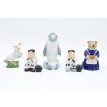 A collection of Wade figures to include 2 prisoners, a penguin decanter, a Collector's Club lamb and