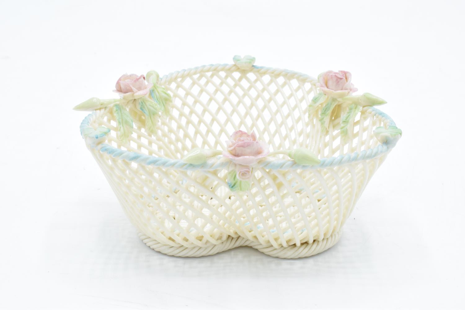 Belleek of Ireland trefoil-shaped weave basket with floral decoration with painted highlights. In