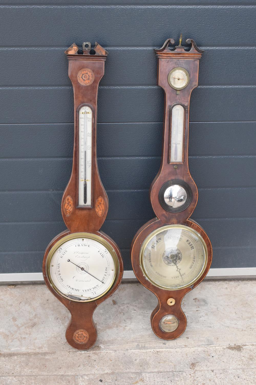 A pair of 19th century mahogany barometers one with inlaid motifs such as shell (both a/f). Please