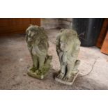 A pair of vintage reconstituted stone upright lions (2).