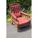 Late Victorian walnut gentleman's Chesterfield style library chair with button back leather