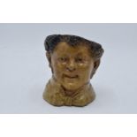 A 19th century Bernard Bloch stoneware tobacco jar in the form a boy, impressed marks to base '