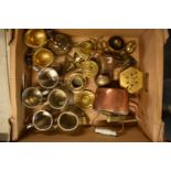 A mixed collection of items to include brass ware, money boxes, a copper kettle, trinkets, letter