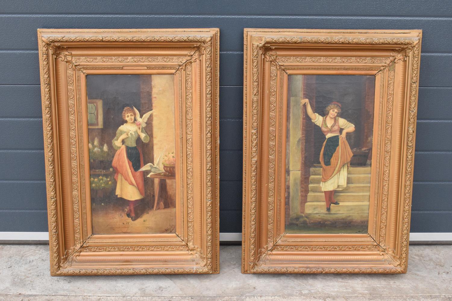 A pair of 19th century oil paintings on canvas depicting pretty ladies in room settings.
