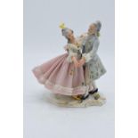 A late 19th / early 20th century Dresden lace figure of a couple dancing with the 'N' mark below a