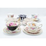 A collection of china cups and saucers to include duos and trios by makers such as Royal Albert,