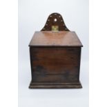 A 19th century Victorian wooden candle box/ salt box with lift up lid and brass beading. 38cm