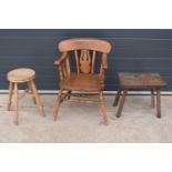 A collection of early 20th century farmhouse furniture to include a captain's chair style chair, a 4