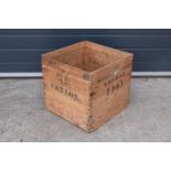 A vintage wooden advertising crate with 'Ceylon' and 'London' marked onto the sides amongst other